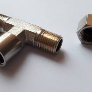 Double T 1/8 internal with a plug for two 1/8