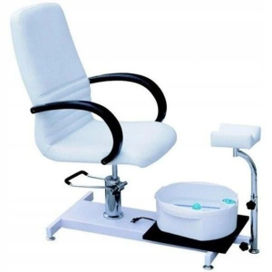 Chair of the client with the workplace of the pedicure master