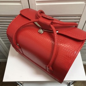 Rode koffer voor visagist
