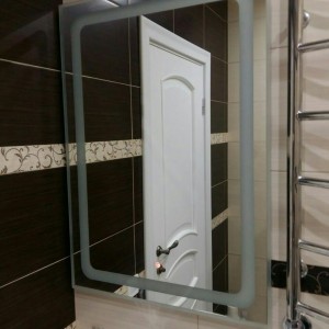 A mirror with led lighting. Led mirror for bathroom
