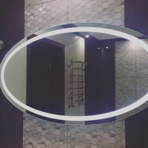 Oval bathroom mirror with LED lighting