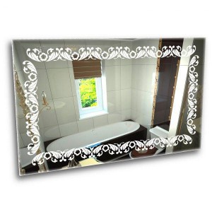  A mirror with an ornament in the bathroom. Ice mirror