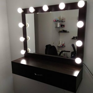  Mirror with a shelf for robots in the salon